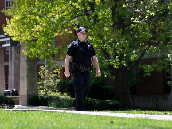 Officer walking on campus